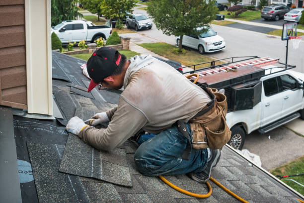 Professional Flat Roof Repair technician working in Dougherty, IA